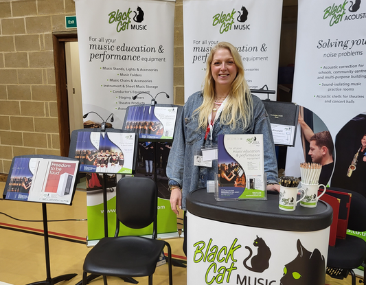 Amy on the Black Cat Music exhibition stand